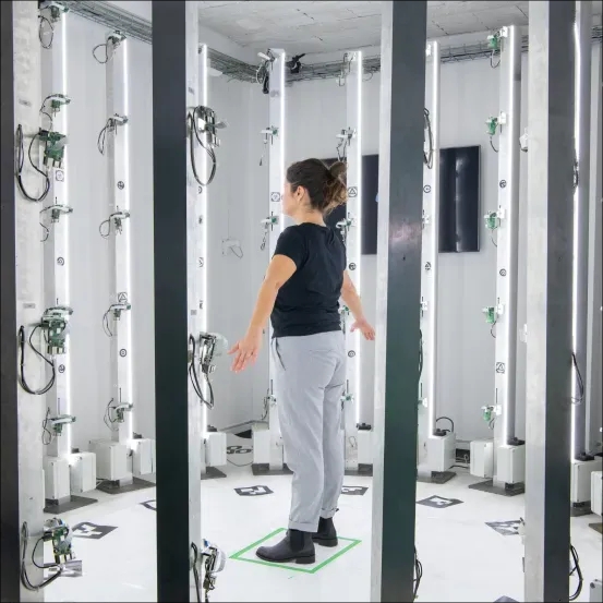 Woman in a 3D Scan cage